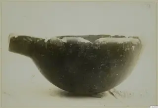 Pottery Red Polished II bowl from Lapithos, with a horizontal handle projecting to the left