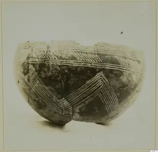 Pottery Red Polished II bowl from Lapithos, Vrysi tou Barba tombs, with linear incised decoration in chevron and band patterns