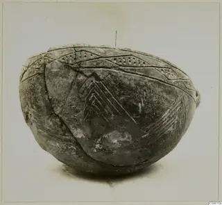 Red Polished III bowl from Lapithos with incised chevron and dotted band decoration