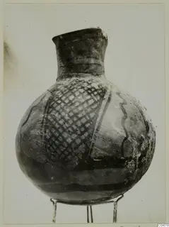 Globular vessel with a narrow neck and painted lattice and band decoration, White Painted I-II ware from Lapithos