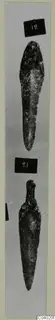Two corroded bronze tools from Amathus, each shown in its own photograph with a number label