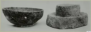 Stone bowl and stone cover from Lapithos Tomb 408, shown side by side against a plain background.