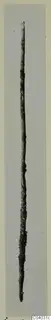 Long slender bronze tool, corroded and pointed at one end, from Idalion