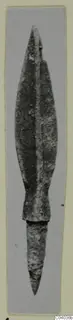 Bronze weapon from Idalion: a corroded leaf-shaped blade with a central ridge and narrower lower section