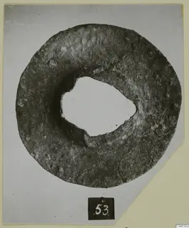 Ring-shaped object with a large central hole, from Amathus tombs 10–26.
