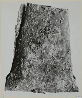 Bronze mounting fragment from Idalion, corroded and encrusted
