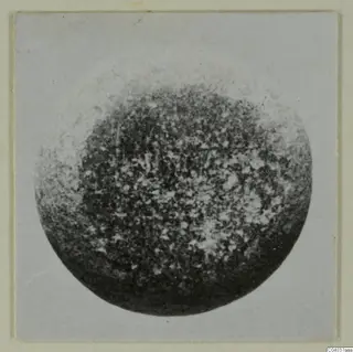 Round dark speckled object, recorded as a piece of jewellery, from Idalion small finds