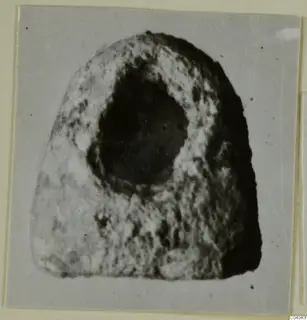 Glyptic find from Idalion: a stone object with a rounded top and a large round hollow near its centre