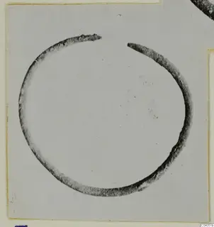 Open bronze ring fragment with tapering ends, shown on a mounted card