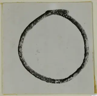 Bronze ring-shaped personal adornment from Idalion, shown alone on a pale background