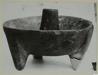 Three-legged stone bowl with a pestle standing upright in it, Enkomi small finds