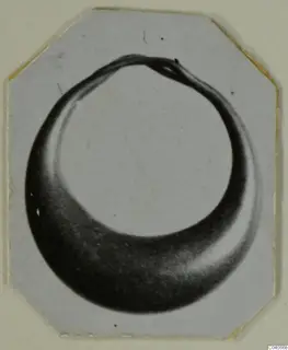Bronze ring-shaped fragment from Idalion, shown as a photograph mounted on a card