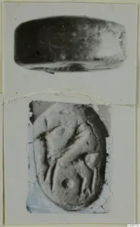 Two photographs of an oval engraved seal on a card mount: a side view above and its carved face below.