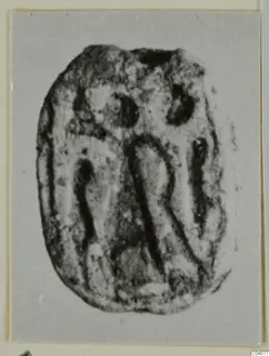 Engraved seal or gem from Ayia Irini, photographed on a grey card