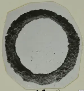 Ring-shaped object from Marion, Tomb 83, shown as a print on a pale card mount