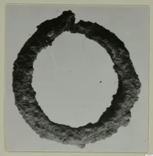 Ring from Marion: a thick, dark, corroded ring shown flat against a pale grey background.