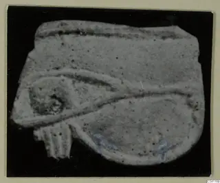 Fragment of an object with curved dark bands and a ridged edge, from Amathus