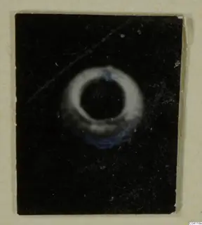 Gold ring shown against a dark background, from Amathus finds
