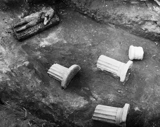 Excavated room floor at Cholades, Soli, with a carved stone block and fluted stone pieces lying in situ