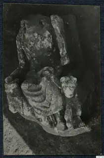 Weathered stone sculpture fragments lying in the soil as found at Cholades, Soli