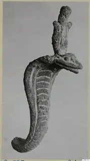 Bronze object with a snake-like head and ridged curved body, from Soli