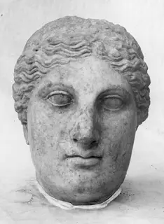 Marble head of a woman with wavy hair, photographed face-on from Cholades, Soli