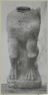Stone statue of a four-legged animal, seen from behind, from Soli
