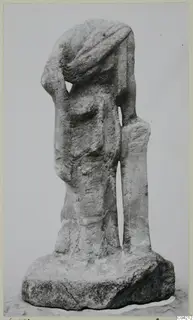 Marble sculpture of a standing figure with its head covered by drapery, one arm raised to the head, beside an upright support