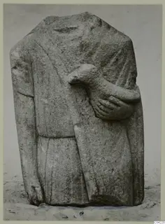 Headless limestone statue of a standing figure in a long garment, from Mersinaki