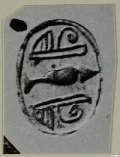 Oval seal face with spiral and linear motifs around a dark central motif