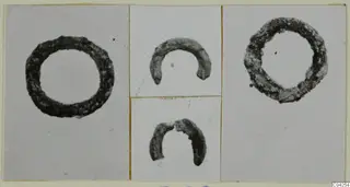 Four photographs of bronze rings and ring fragments mounted on a card, from Milia