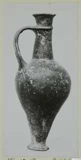Base-Ring Ware jug from Milia, shown upright against a plain background
