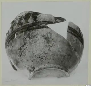 Pottery Bichrome Wheel-made vessel, broken open, with dark painted bands and a triangular pattern on the shoulder