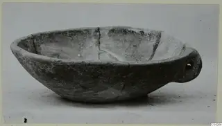 Shallow bowl with a pierced lug handle from Milia, Pottery Plain White Wheel-made