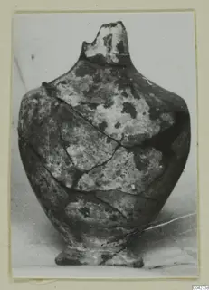 Reassembled jar from Amathus tombs 10–26, shown on a photo card