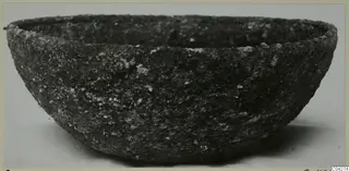 Rough-surfaced bowl from Amathus, shown from the side against a pale background.