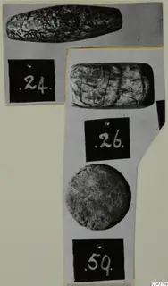 Three stone objects from Amathus shown on a mounted card, each with a number label beneath it