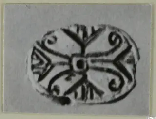 Engraved oval glyptic from Amathus, with a central dot, radiating lines, spirals and chevron-like strokes.