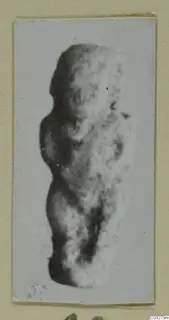 Blurred photograph of a small standing figure from Amathus, tombs 2–26