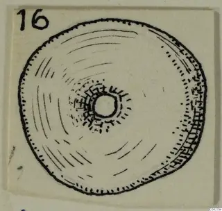 Ink drawing of a round stone object with a central hole and a number label