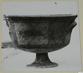 Footed bowl with painted bands and a dark central motif, Pottery Bichrome III