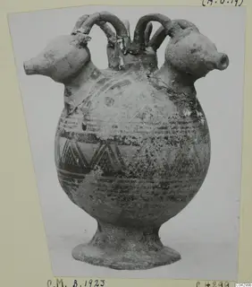 Pottery White Painted I jug with two spouts and arched handles, photographed on a mounted card