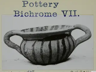 Two-handled bowl with dark vertical stripes on its body and rim, shown on a mounted photo card with a typed label