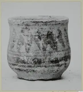 White Painted VII pottery vessel with dark painted decoration on the body