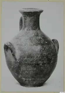 Two-handled pottery vessel with a flared rim and faint painted bands, Black-on-Red I-III