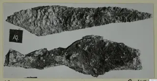 Two corroded iron objects from Amathus: a long pointed blade above and a broken fragment below