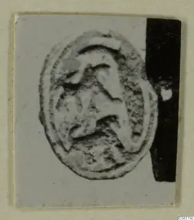 Oval seal or gem with a raised figure, from Amathus