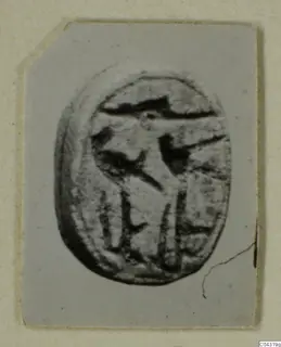 Oval engraved seal from Amathus, with a figure cut into its face