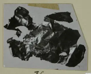 Crumpled fragments of gold jewellery from Amathus, shown on a grey card