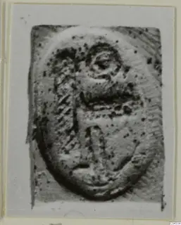 Oval seal or seal impression from Ayia Irini with a raised figure design